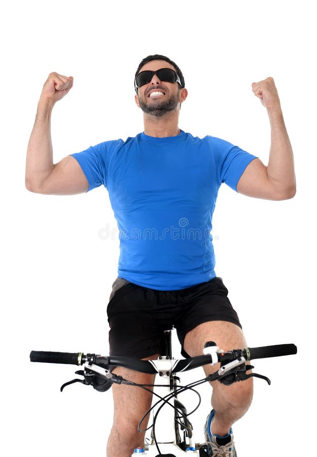 Young sport man riding mountain bike celebrating race victory stock images Young sport man riding mountain bike celebrating race victory stock images