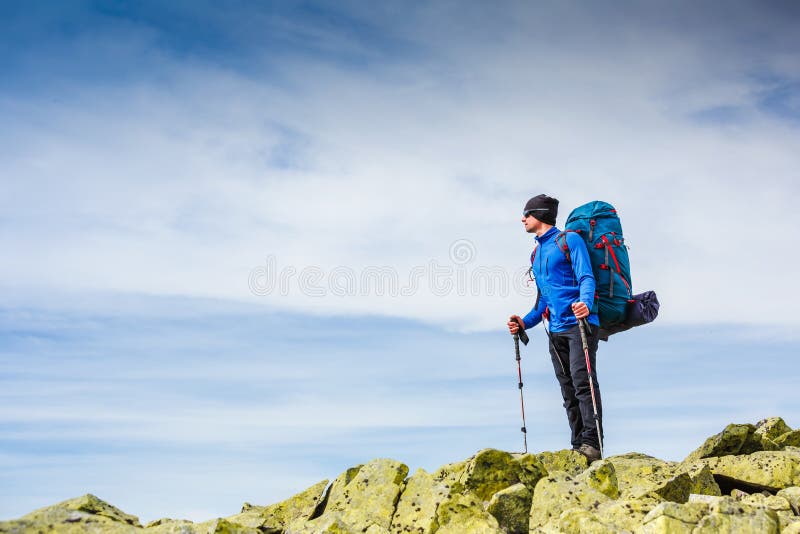 Young sportive hiker trekking in the mountains. Sport and active life royalty free stock photos Young sportive hiker trekking in the mountains. Sport and active life royalty free stock photos