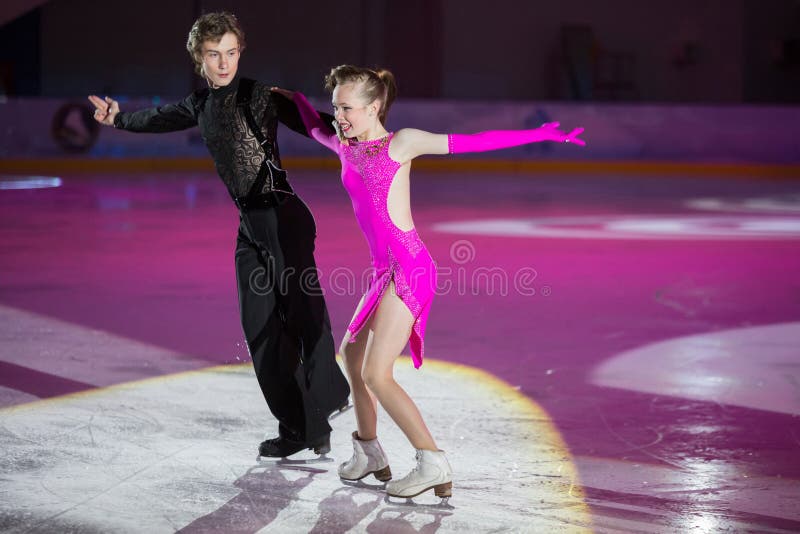 Young sportives display an iceskating shot