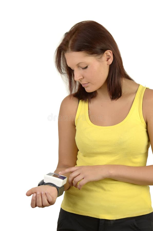 Young sportswoman controlling blood sugar royalty free stock photos