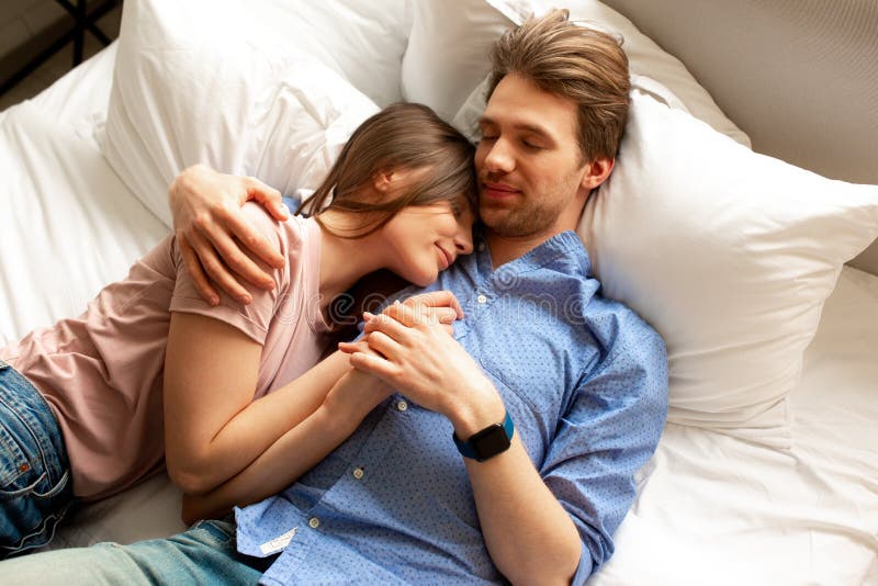 Young Spouses In Love Hugging Each Other In Bedroom Stock Image Image