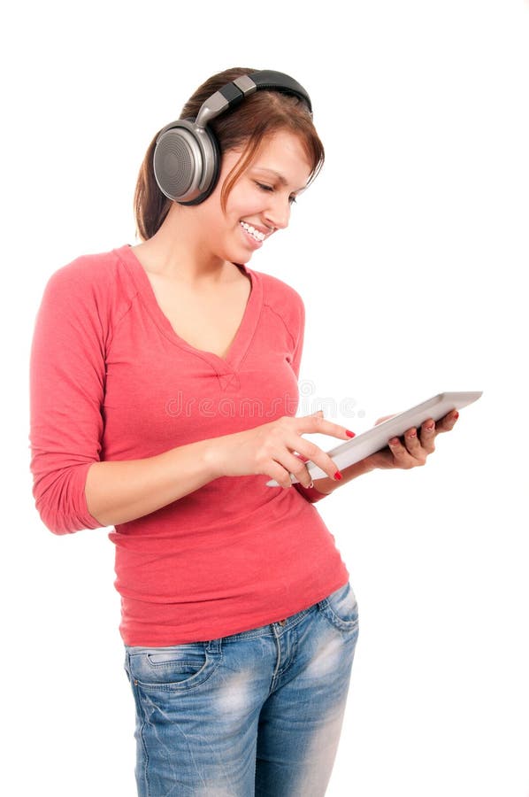 Young student girl with tablet pc and headphones