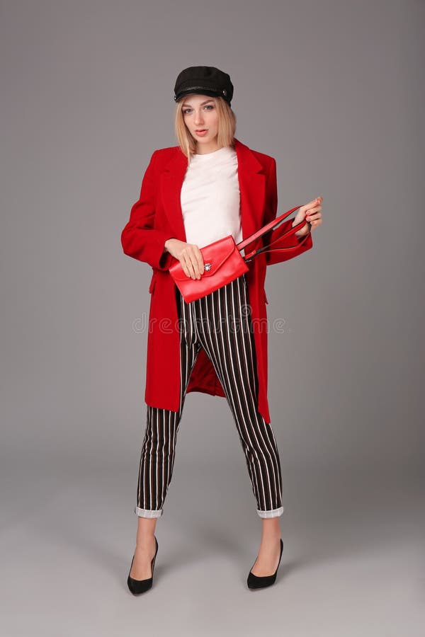 Young stylish woman in trendy shoes with bum bag royalty free stock image Young stylish woman in trendy shoes with bum bag royalty free stock image