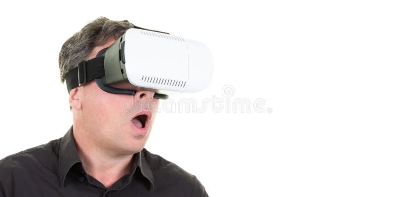 Young surprised man with vr headset on white background copy space royalty free stock photos