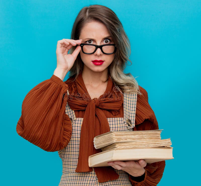 Young Teacher In Glasses With Books Stock Photo Image of face, people