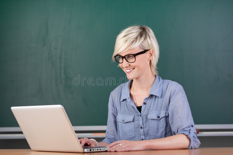 Young Teacher With Laptop stock photos Young Teacher With Laptop stock photos
