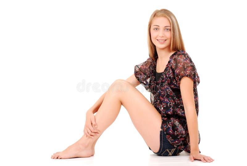 Young Teen girl sitting down royalty free stock photos