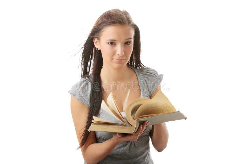 Young teen student woman reading a book