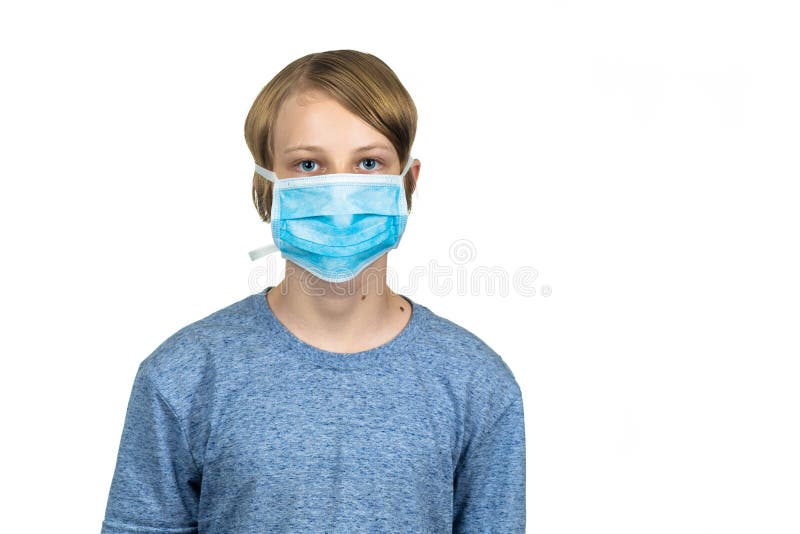 Young teenage boy wearing a protective mask. Isolated on white stock photography Young teenage boy wearing a protective mask. Isolated on white stock photography