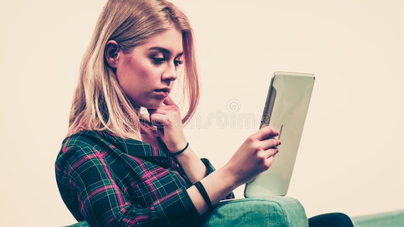 Young woman using tablet royalty free stock images