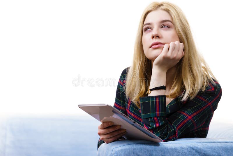 Young woman using tablet stock image