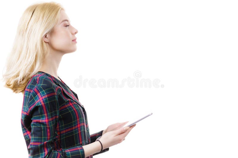 Young woman using tablet stock photography
