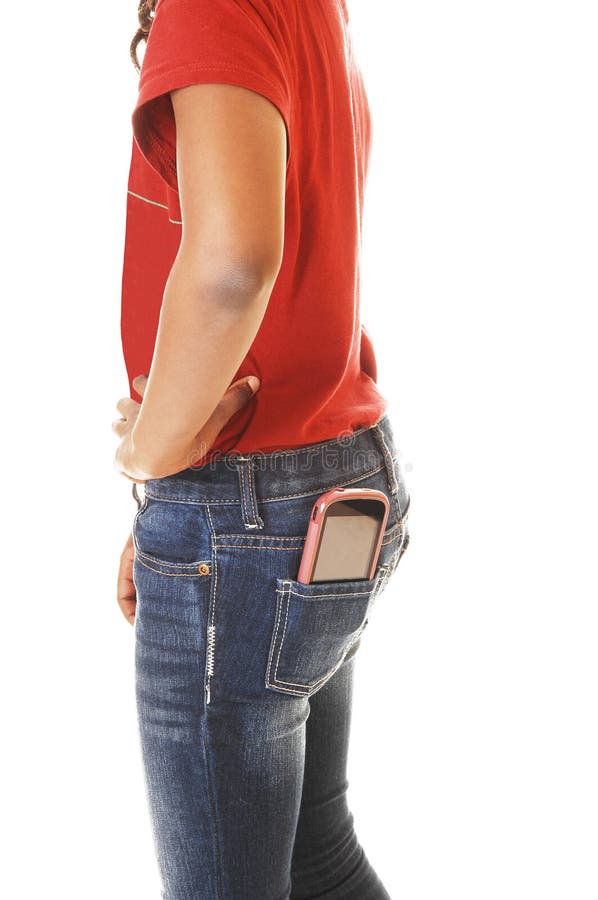 Teen girl with cellphone in pocket.