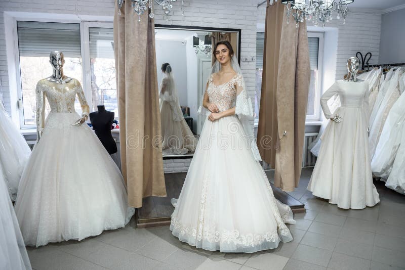 Young and Tiny Bride in Wedding Dress in Salon Stock Image Image of