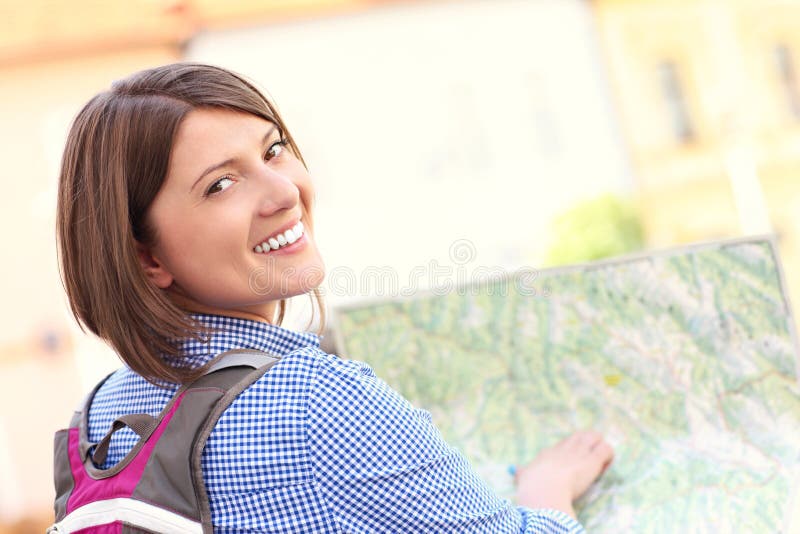 Young tourist with a map