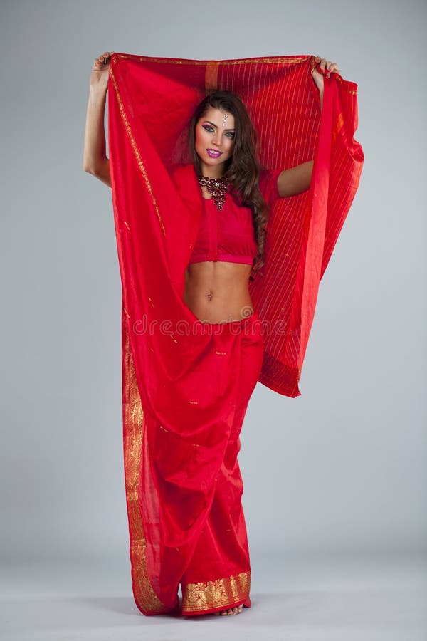 Young traditional Asian Indian woman in indian sari