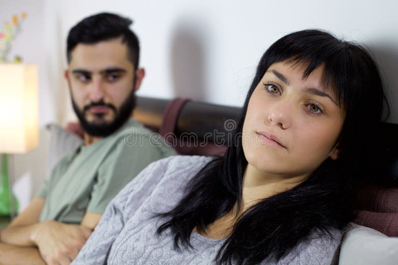 Unhappy couple in bed fighting sad closeup royalty free stock images Unhappy couple in bed fighting sad closeup royalty free stock images