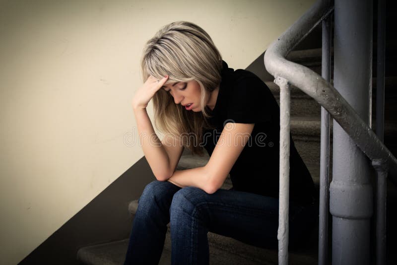 Young unhappy woman in depression royalty free stock photos