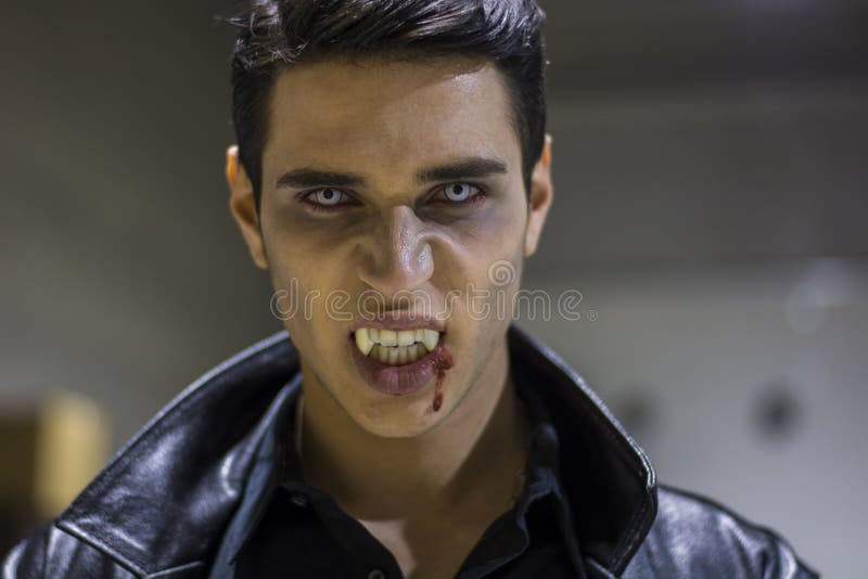 Young Vampire Man Face With Blood On His Mouth Stock Photo ...