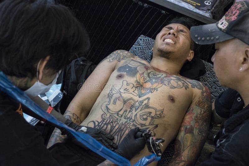 Young Vietnamese Man is Enduring Pain As he Gets a Tattoo on His Belly by  Orang Utan Tattoo Studio Editorial Photography - Image of colors,  indochina: 131645902