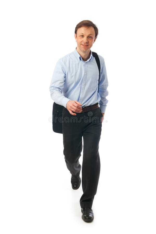 The young walking businessman isolated on a white