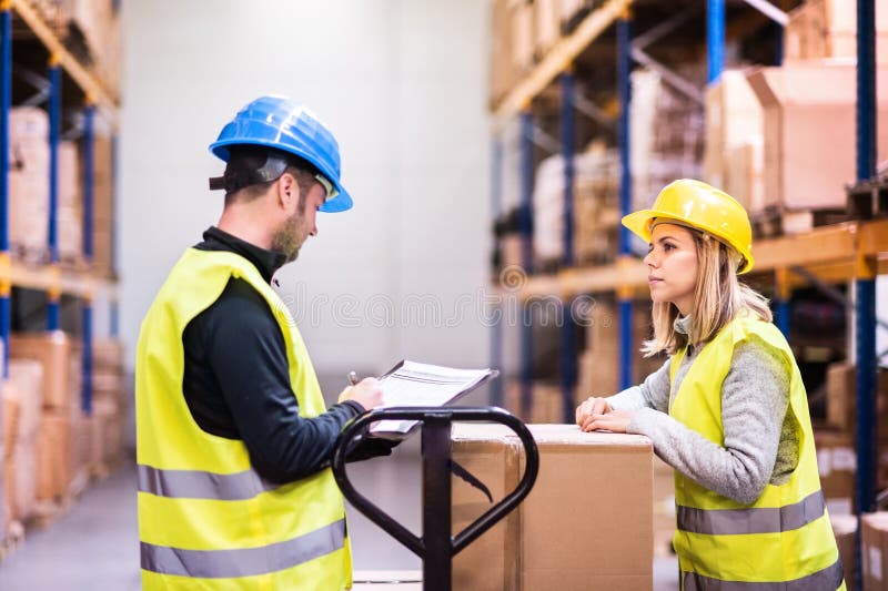 Young Warehouse Workers Working Together. Stock Image Image of clipboard, building 109941973