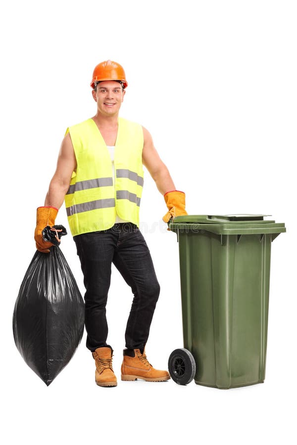 Young waster collector emptying a trash can stock photo Young waster collector emptying a trash can stock photo