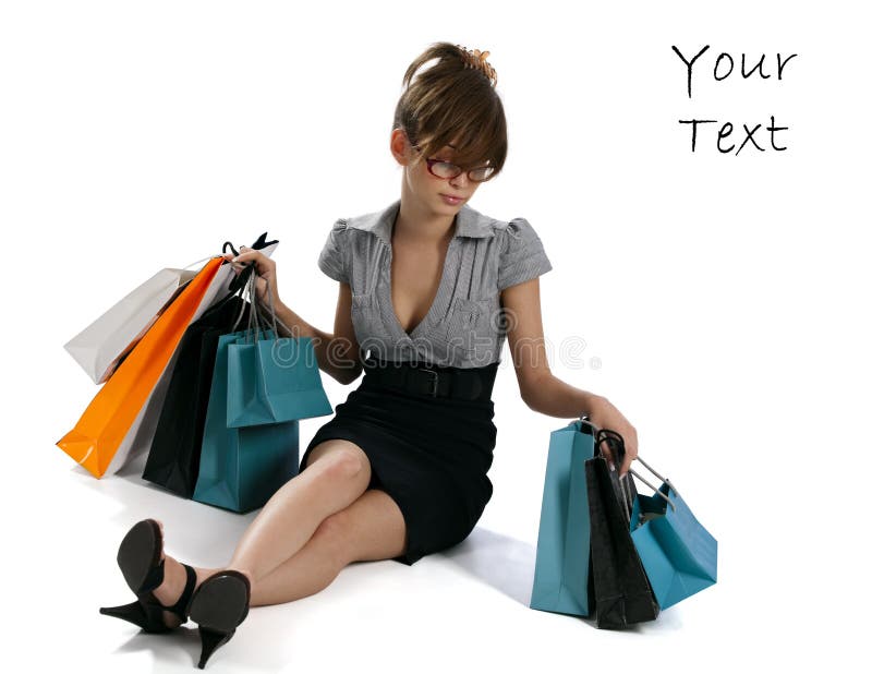 Young woman admiring her shopping