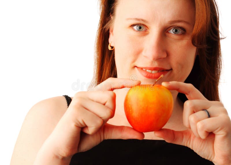 Young woman with an apple