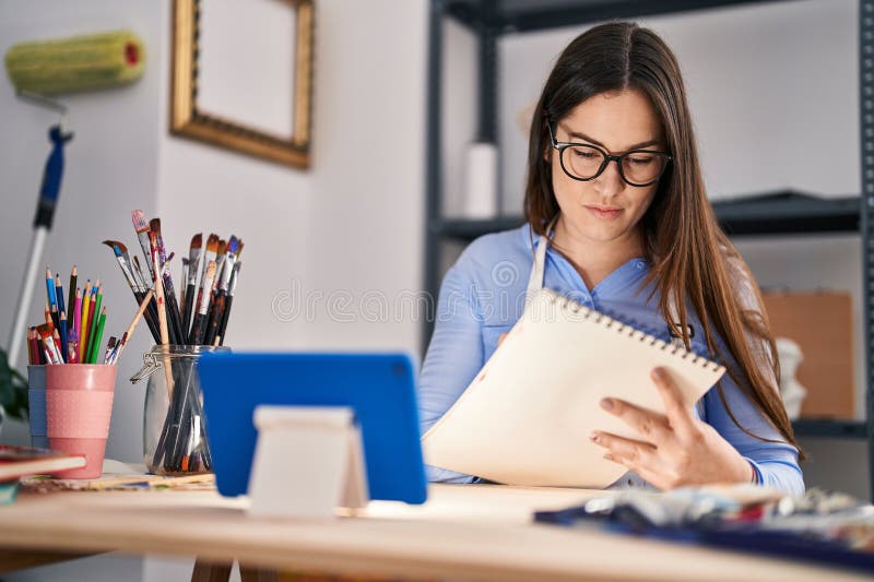 Young Woman Artist Using Touchpad Drawing on Notebook at Art Studio Stock Photo Image of apron