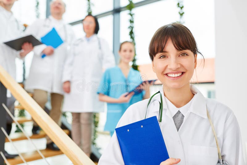 Young woman as doctor or physician stock photo