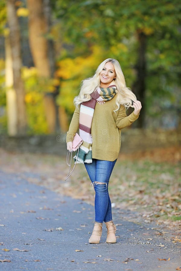 Young woman in Autumn pose