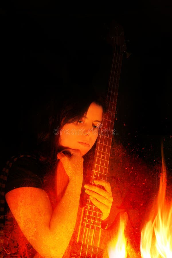 Young Woman with Bass Guitar and Flames