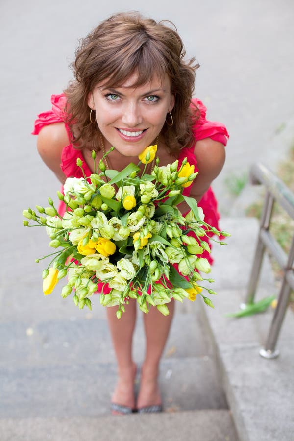 Young woman with beautiful bouquet