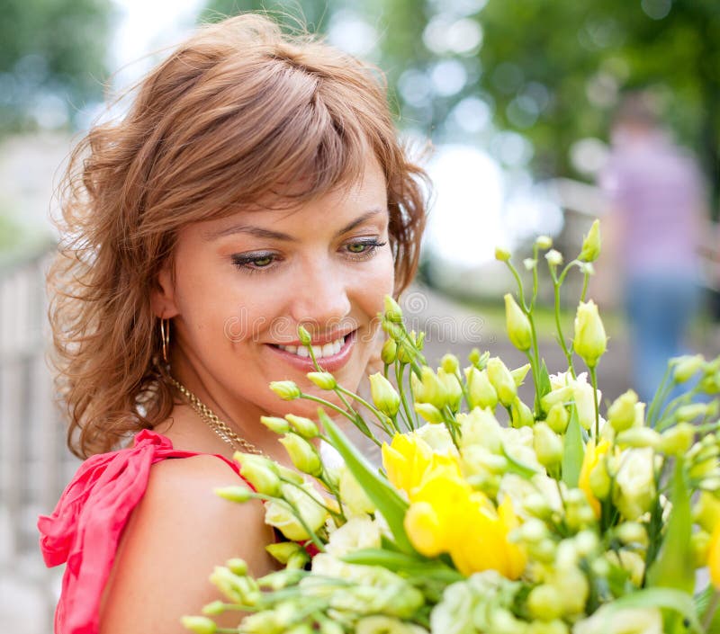 Young woman with beautiful bouquet