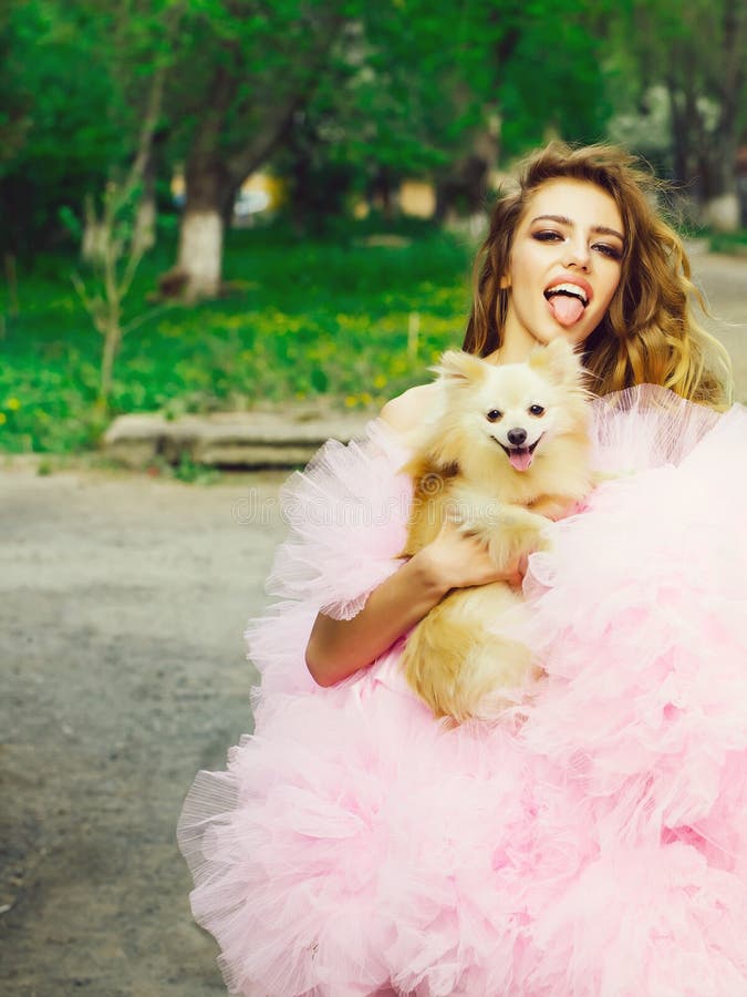 Glamour woman with dog stock image. Image of attractive - 130226935