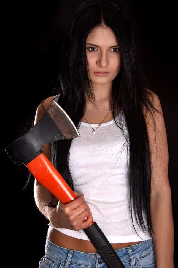 Young woman with a big axe royalty free stock images Young woman with a big axe royalty free stock images