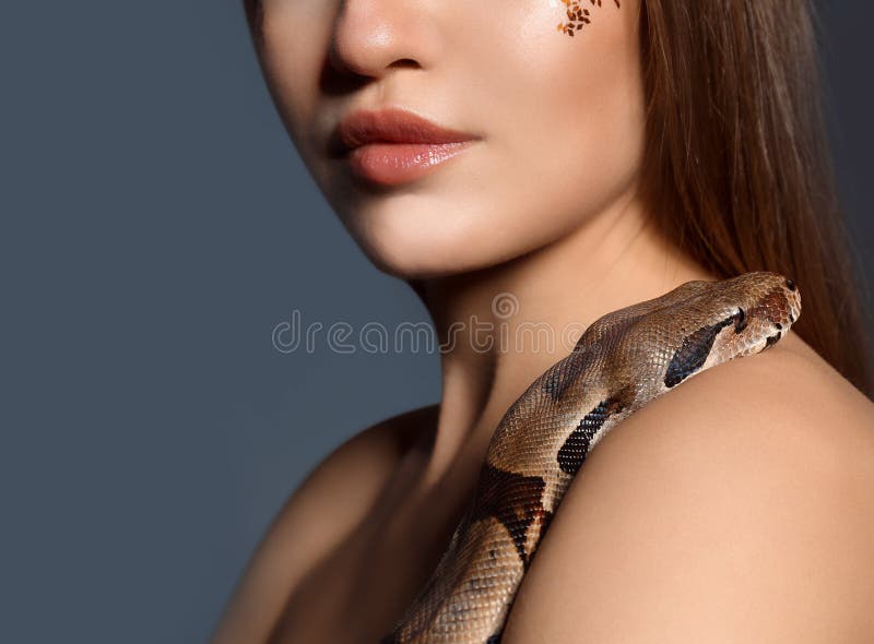 Young Woman with Boa Constrictor on Grey Background Stock Photo - Image ...