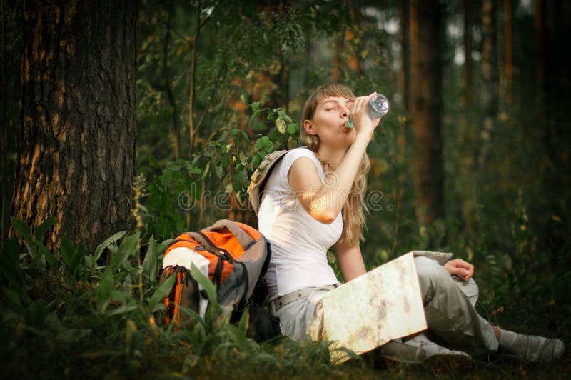 Young woman with bottle of water