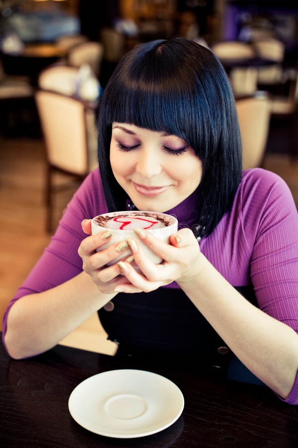 Young woman in cafe