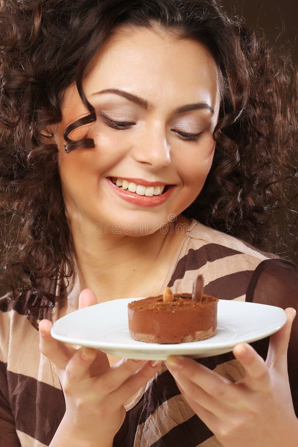 Young woman with a cake stock photo. Image of birthday 32918286
