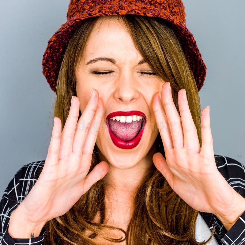 Young Woman Shouting Or Sreaming A Warning royalty free stock image Young Woman Shouting Or Sreaming A Warning royalty free stock image