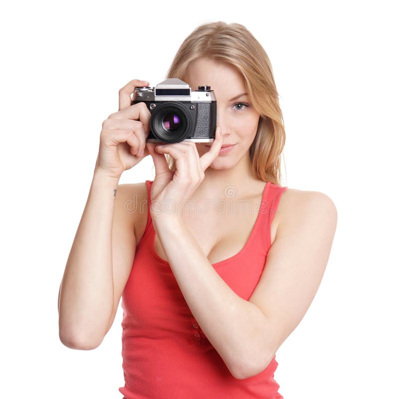 Young woman with camera stock photo. Image of blond, isolated 50947990