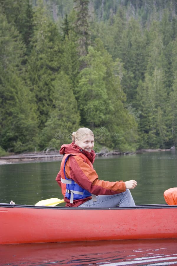 Young woman canoeing