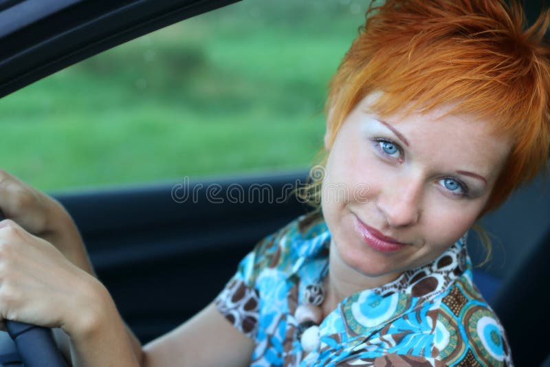 Young woman in a car