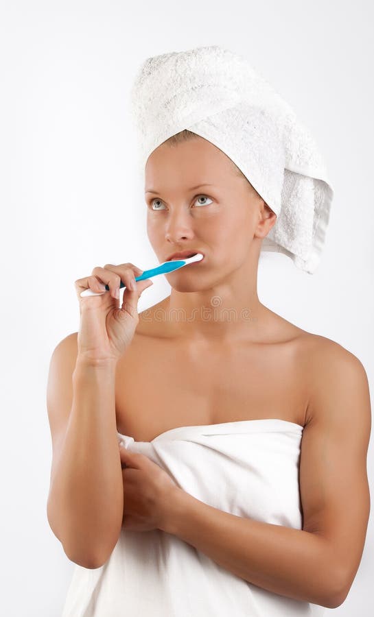 Young woman clean teeth by tooth brush