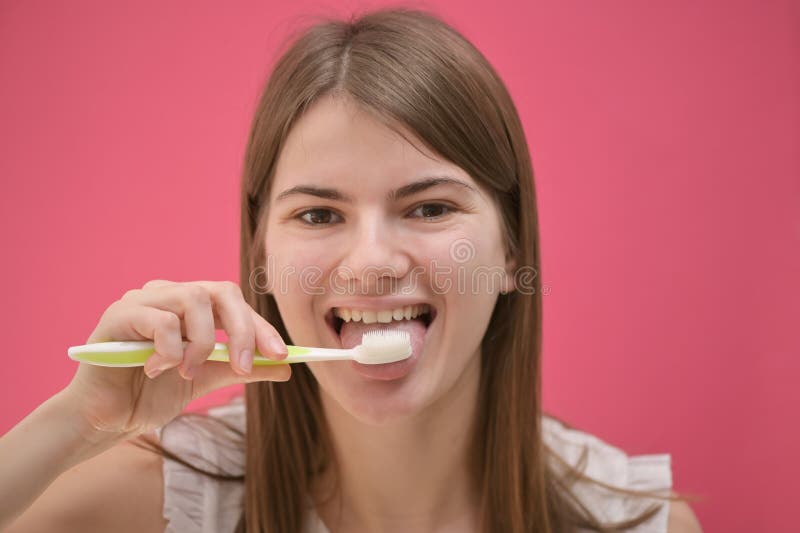 Young Woman Cleaning Tongue Using Toothbrush Stock Photo Image of