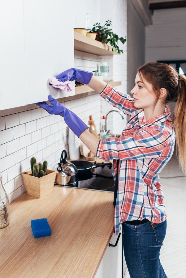 362 Girl Wiping Kitchen Furniture Stock Photos - Free & Royalty-Free ...