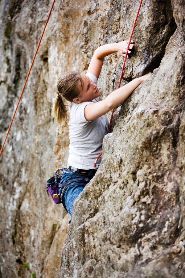 Young Woman Climbing