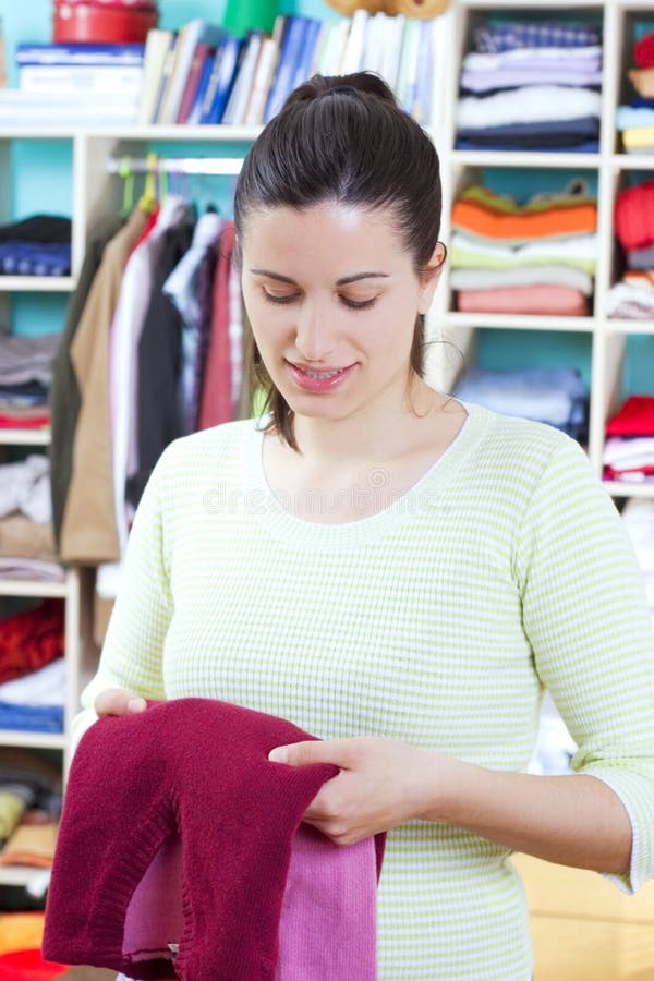 Young woman with clothes